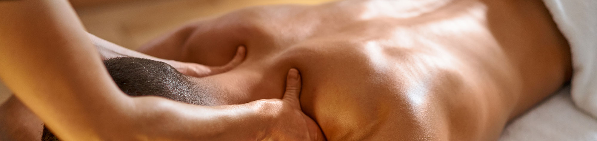 Man receiving massage in Corwen